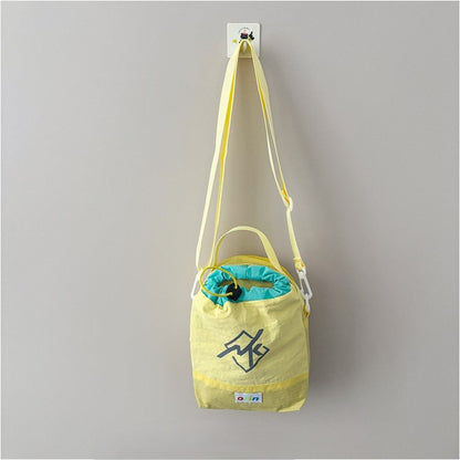 Kids mini shoulder bag, 100g ultra-light, water-resistant, nylon blend, adjustable strap, fits snacks and small essentials.
