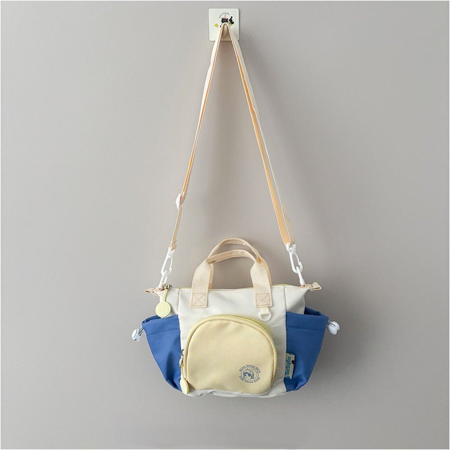 Kids mini crossbody bag, 170g lightweight, nylon blend, multi-carry, fits snacks, toys, small essentials.