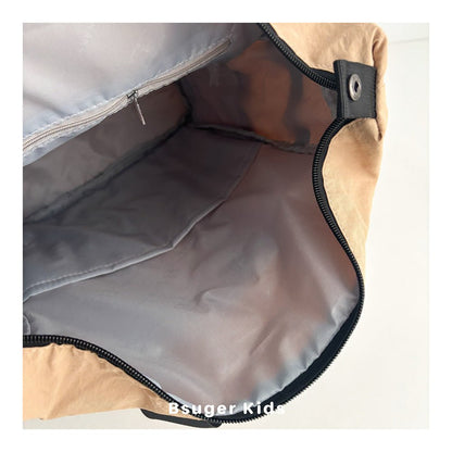 Yellow lightweight backpack, expandable design, breathable, water-resistant, fits iPad, clothes, for travel and daily use.
